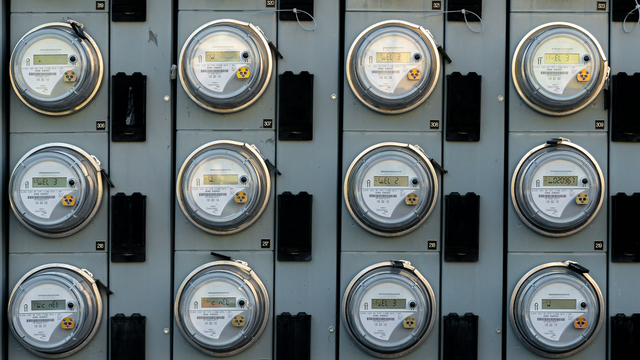 A photo of multiple gauges on a wall