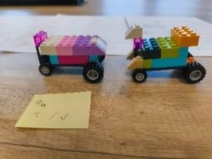 A photo of 2 Lego vehicles made during the Preservation Game Workshop