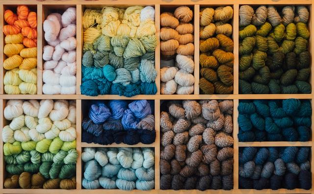 A photo of an collection of different coloured wools