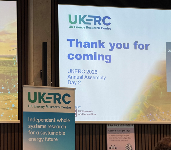 A photo of a UKERC banner next to a screen that says "Thank you for coming"